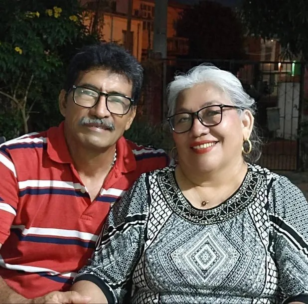 Berzain Cruz y esposa
