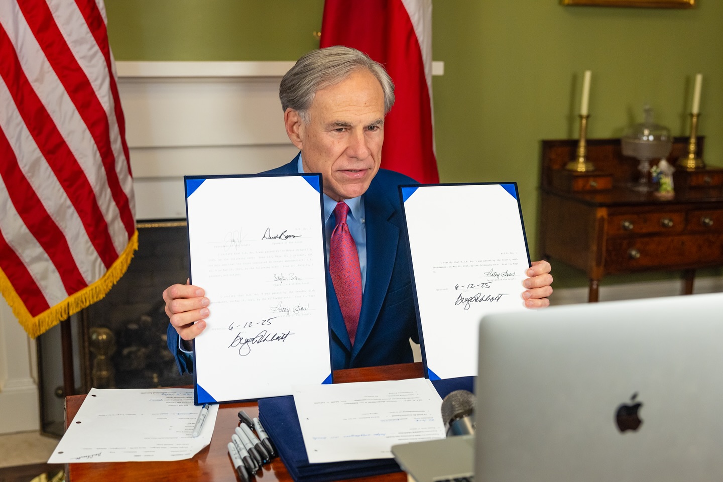 Greg Abbott Show me your papers