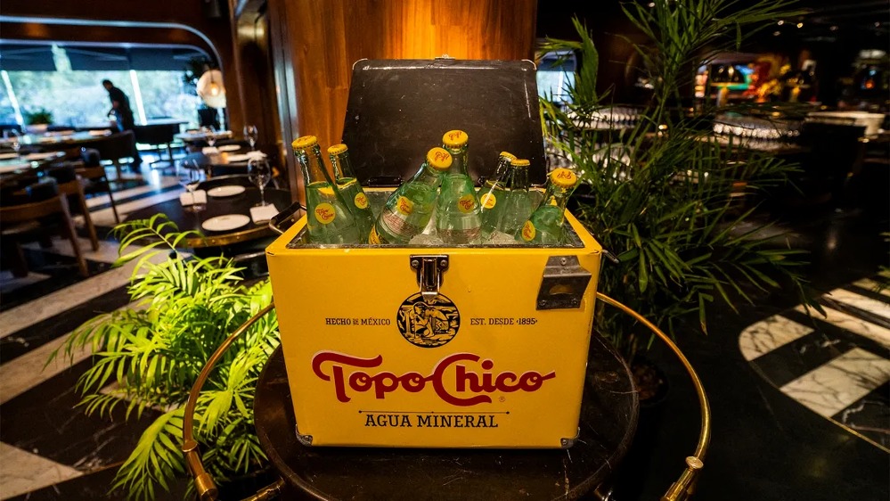 ¿Cuánto dinero debía Topo Chico?